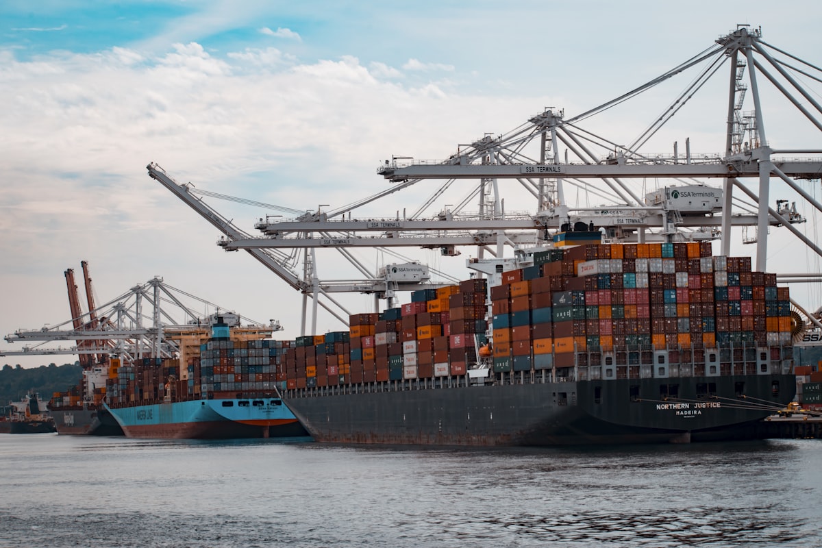Cargo ship at port with shipping containers