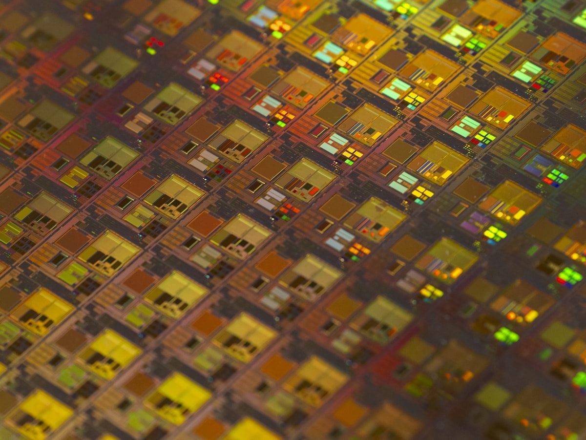 Close-up of a semiconductor wafer showing chip die patterns